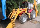 Экскаватор-погрузчик 702ЕМ-03